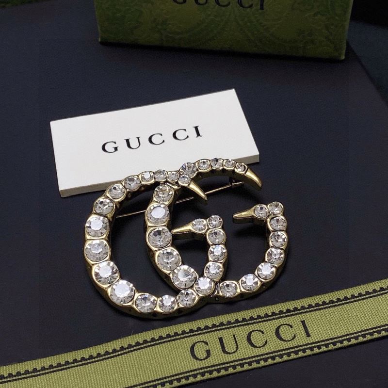 Gvc*1 brooches
